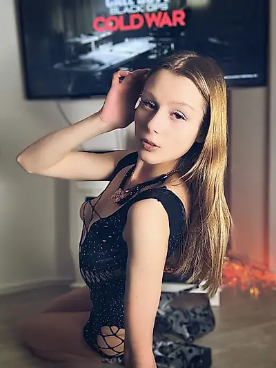 Nude pictures in front of the fireplace and in bed with doggy and more