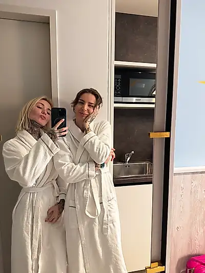 With my hot girlfriend in front of the sauna