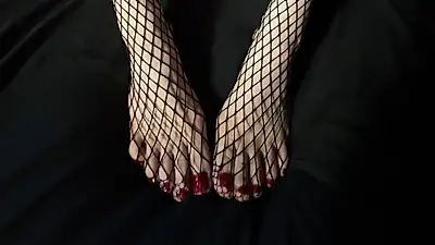 Voeten, nylonkousen, lingerie