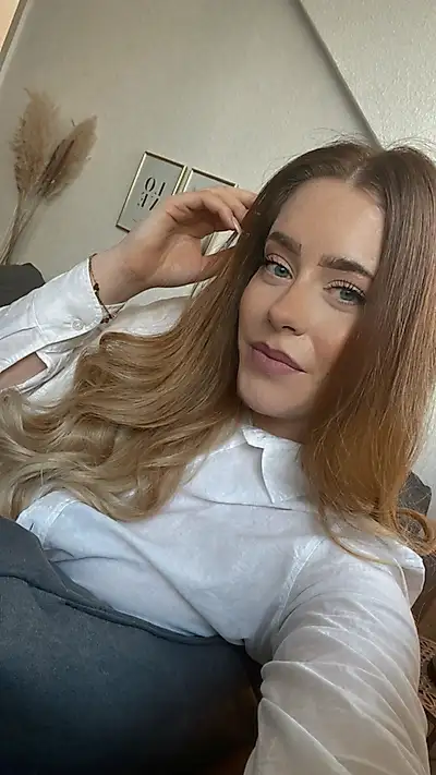 Curvy woman in white blouse and lingerie 