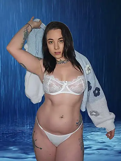 Wet seduction: photoshoot in the rain with sexy lingerie and nude
