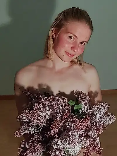 I hide behind the lilacs