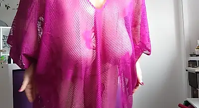 I let my big udders jiggle in the purple mesh poncho. 